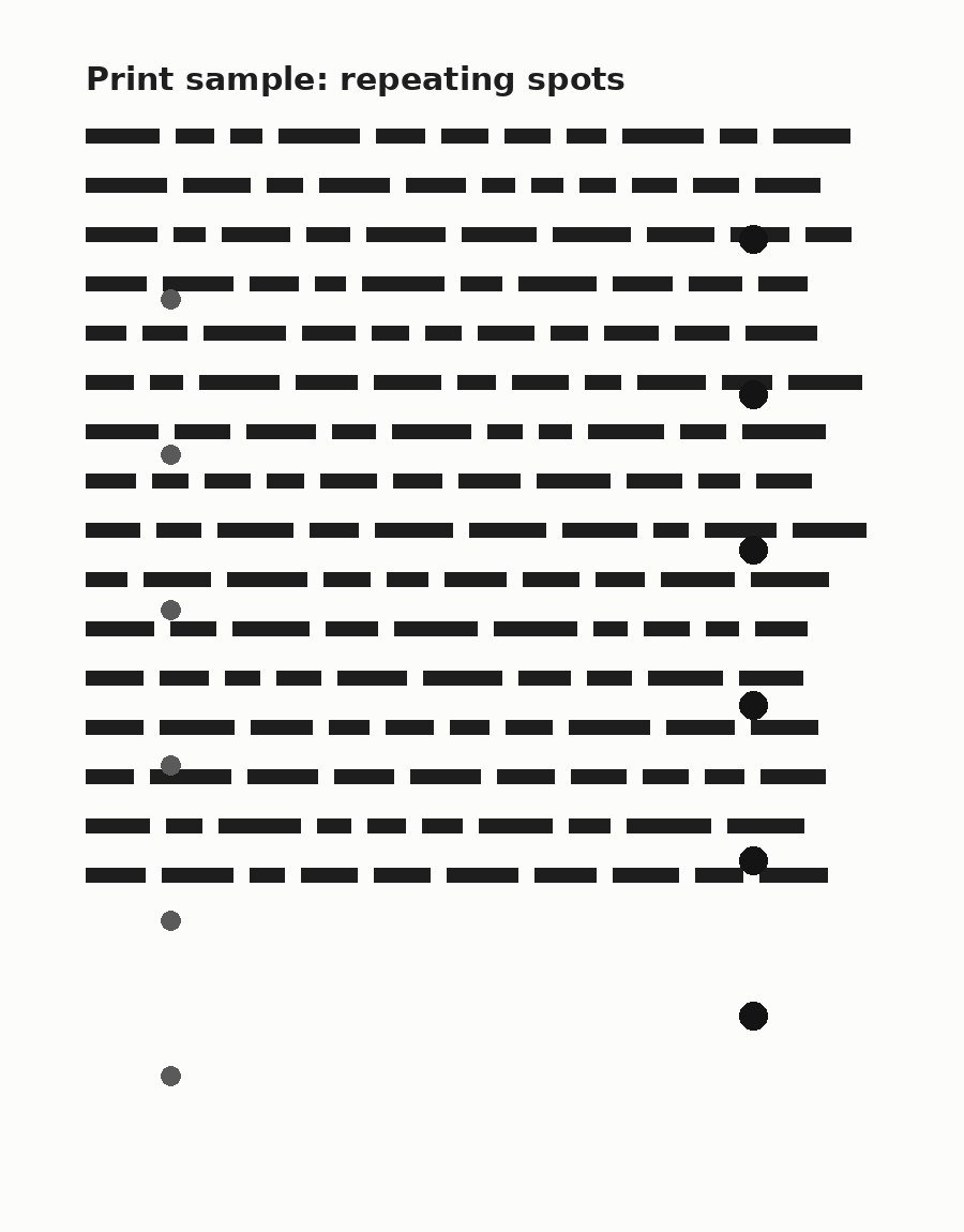 Print sample showing the same spots repeating at regular intervals down the page